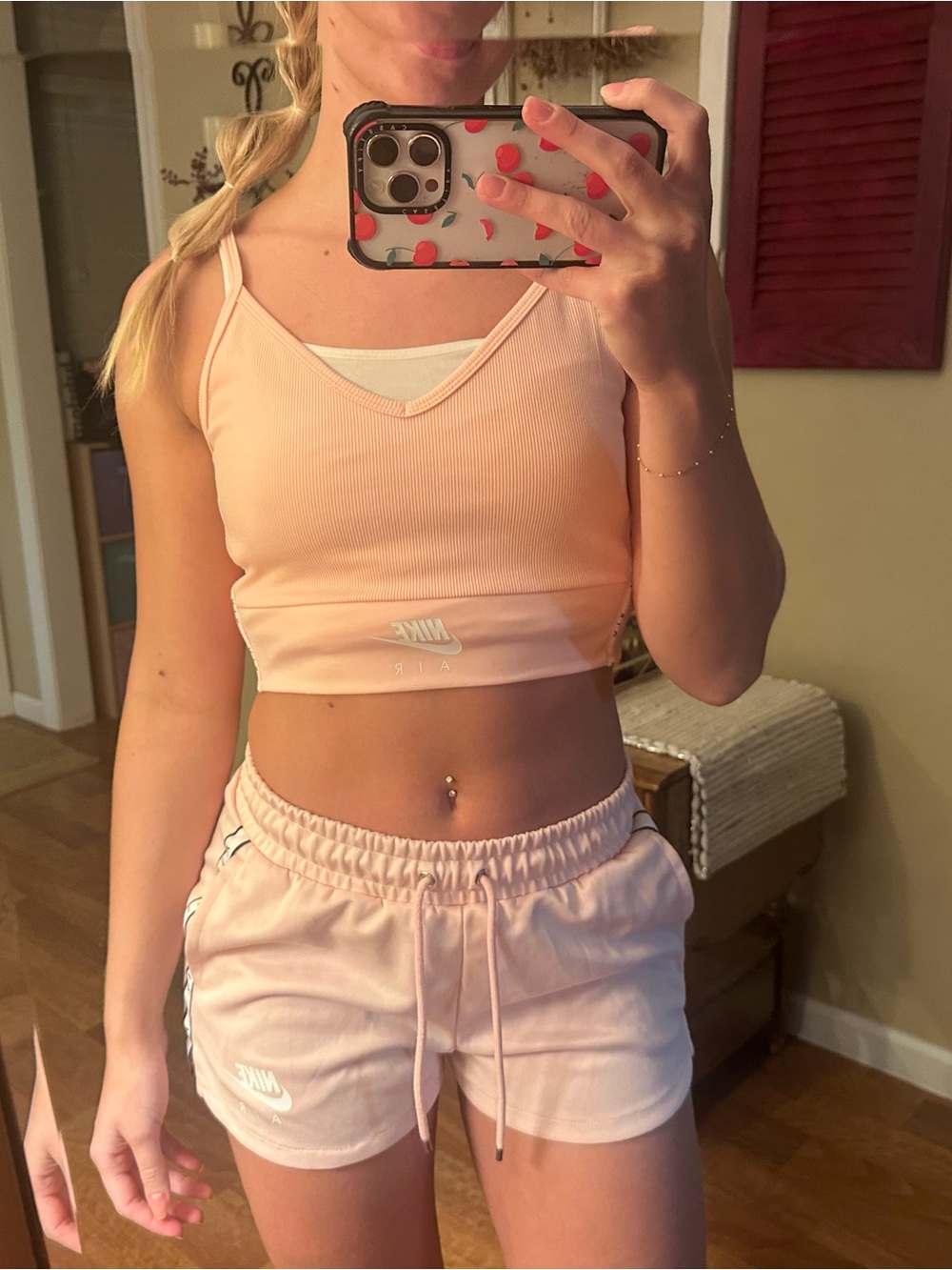 Nike Peach Ribbed V-Neck Cropped Tank and Shorts Set